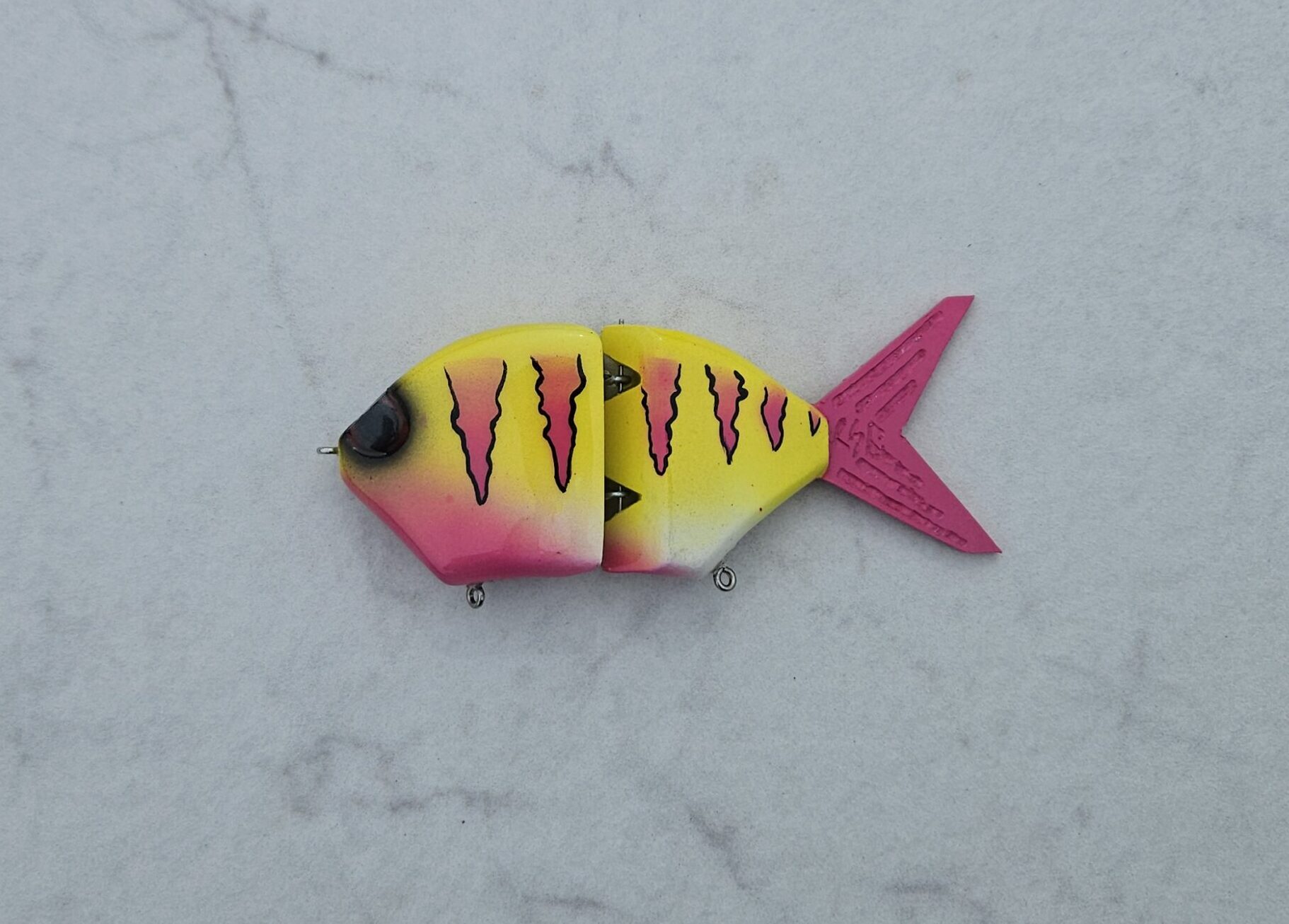 Product Photo - Chaingill (Glidebait with Bluegill Fish Silhouette) - Color Pink Lemonade (yellow top, pink belly, with pink stripes and tail)